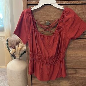 Reddish pink top. Worn once! Brand new size small